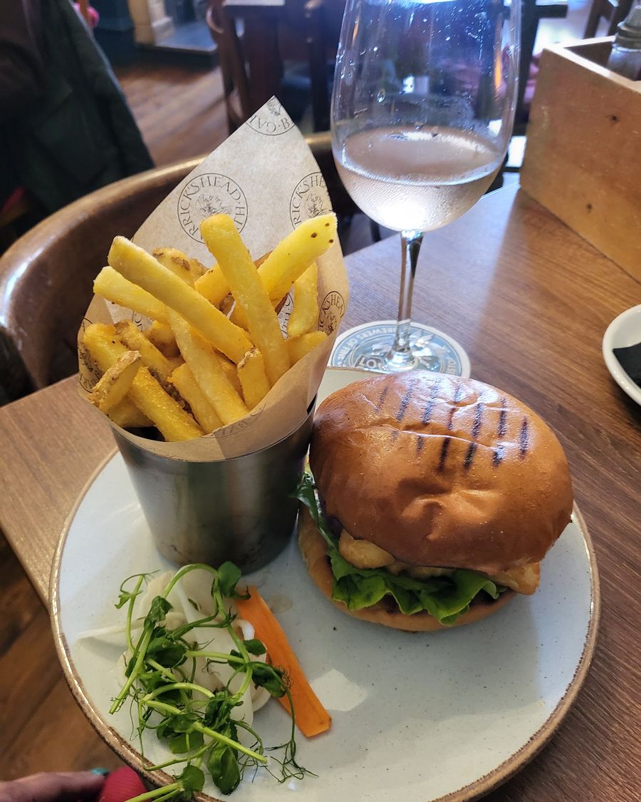 A pub burger and chips on the table at Garrick's Head